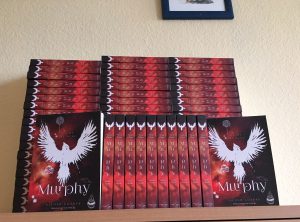 großer Stapel Taschenbücher von "Murphy - Rache ist süß"